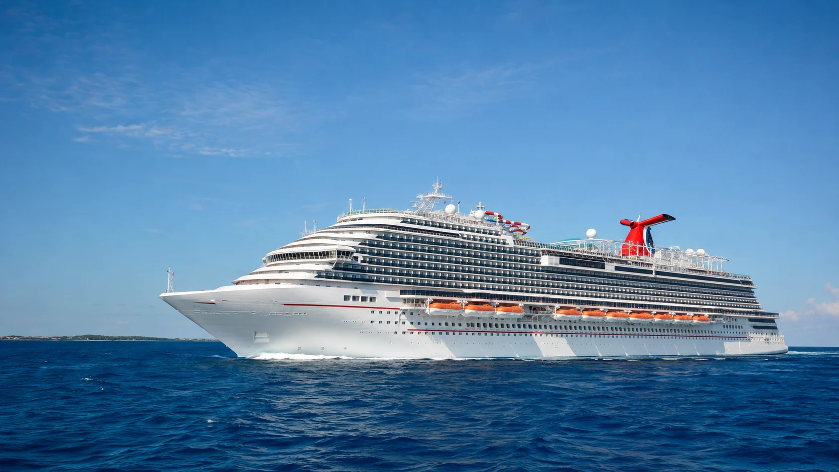 Carnival Horizon sailing under a clear blue sky