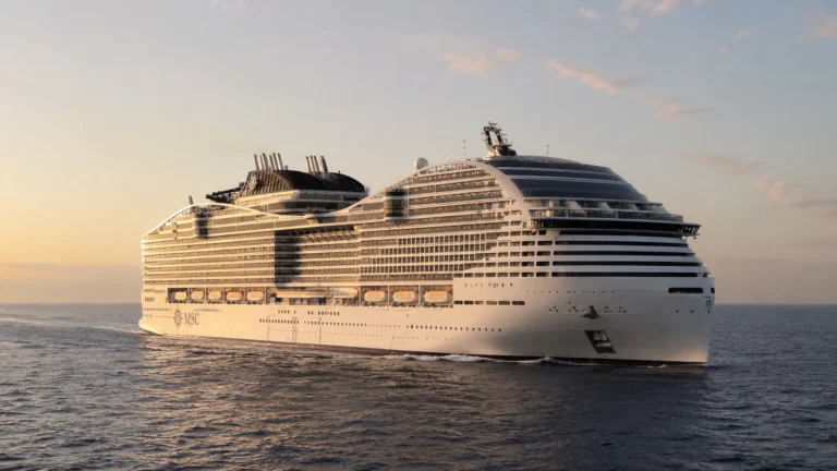 MSC World Europa sailing at sunset