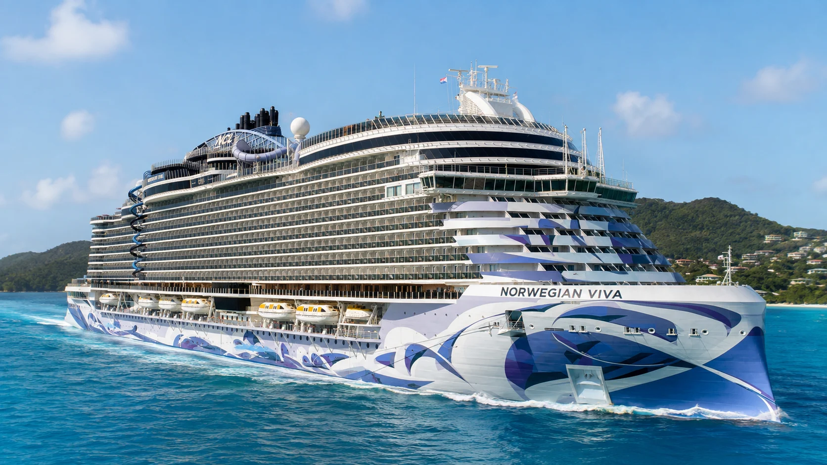 Norwegian Viva sailing near a tropical island