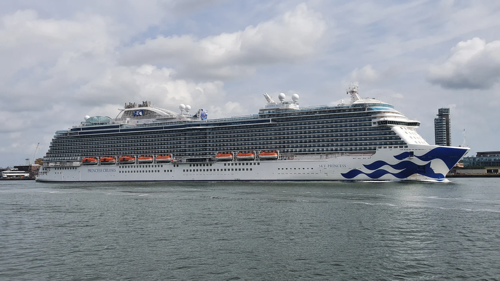 Sky Princess docked beneath a cloudy Southampton sky