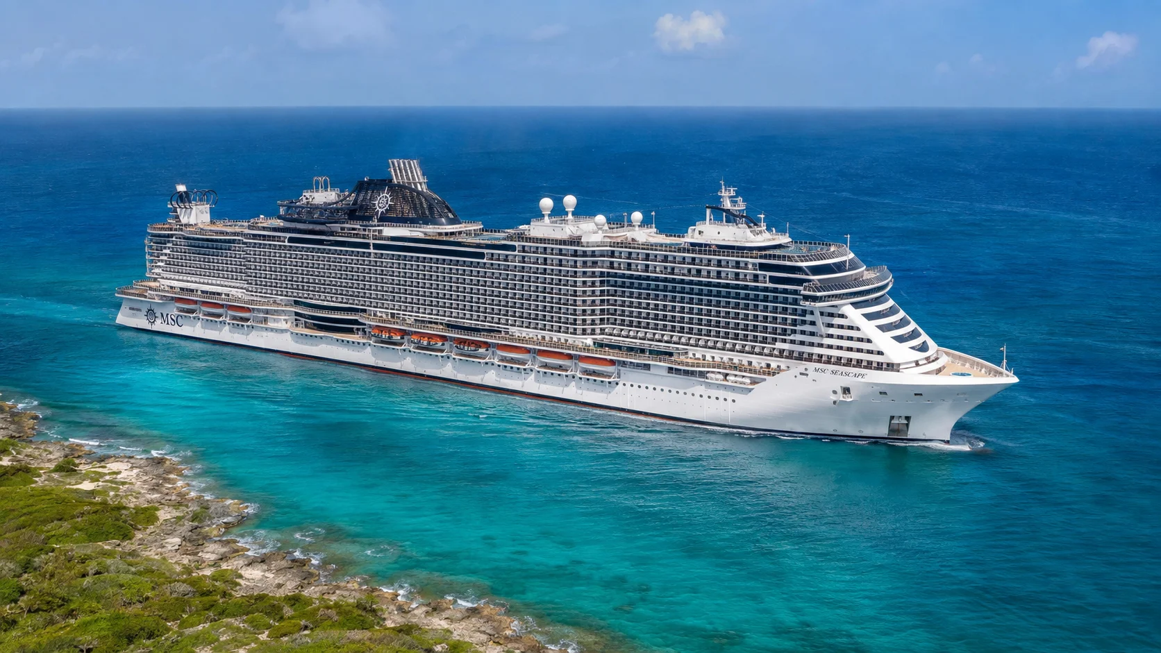 MSC cruise ship anchored in clear turquoise water