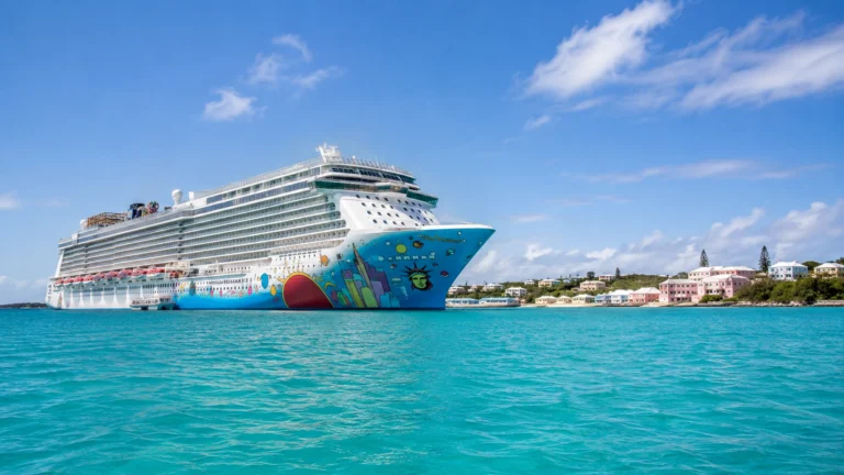 Norwegian Breakaway sailing through bright turquoise water