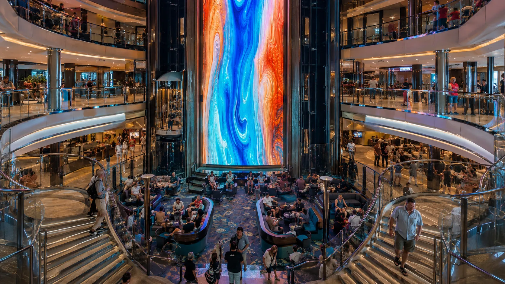 Tall digital art display in the atrium aboard Carnival Panorama