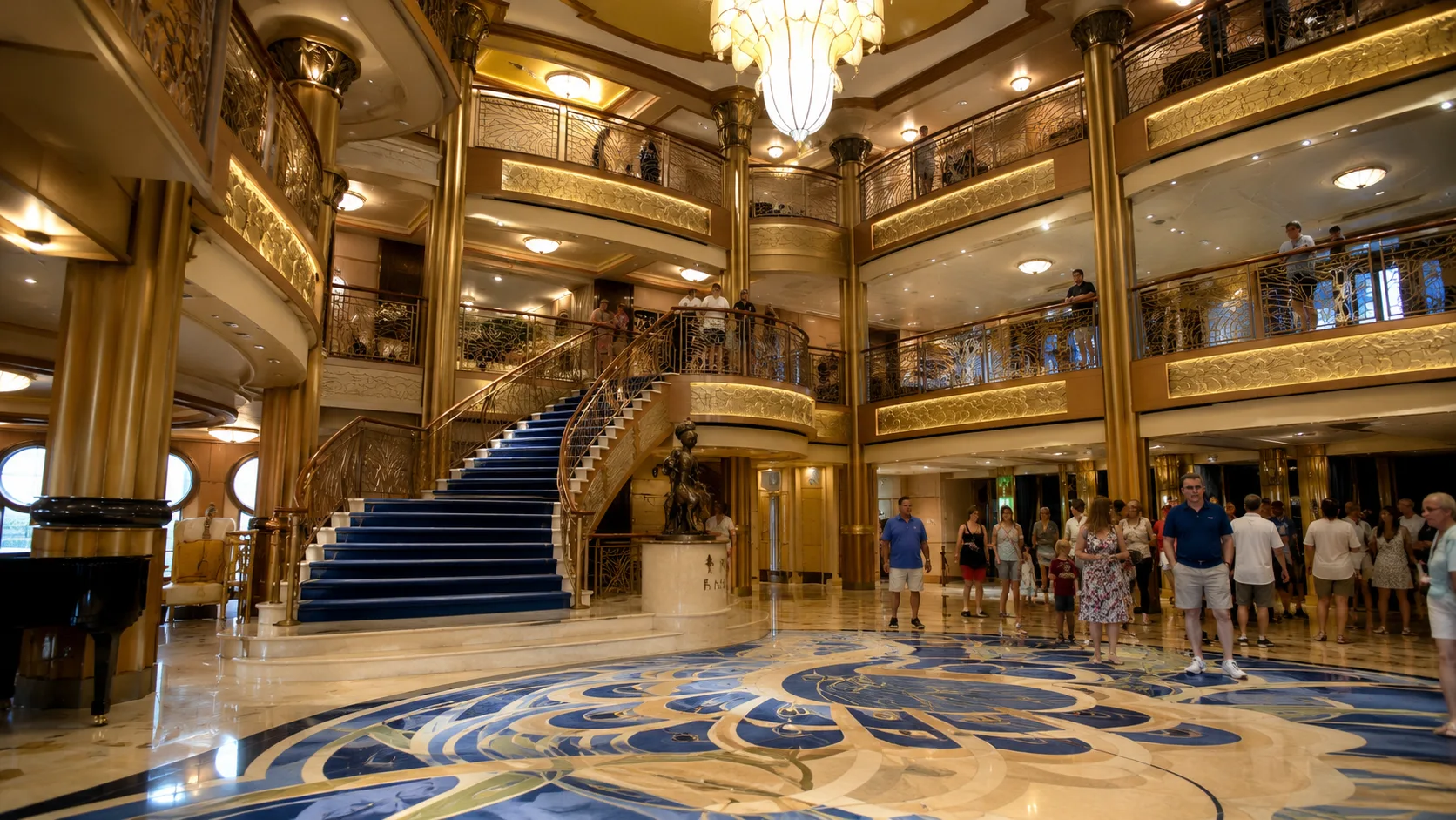 Disney Fantasy atrium with grand staircase and chandelier