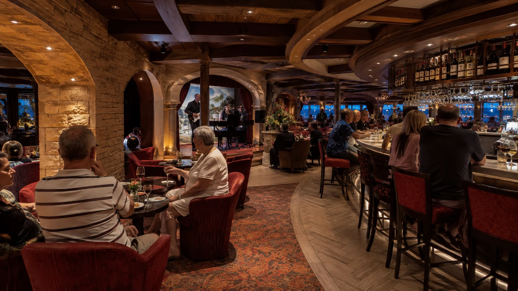 Guests seated around a warmly lit lounge and bar
