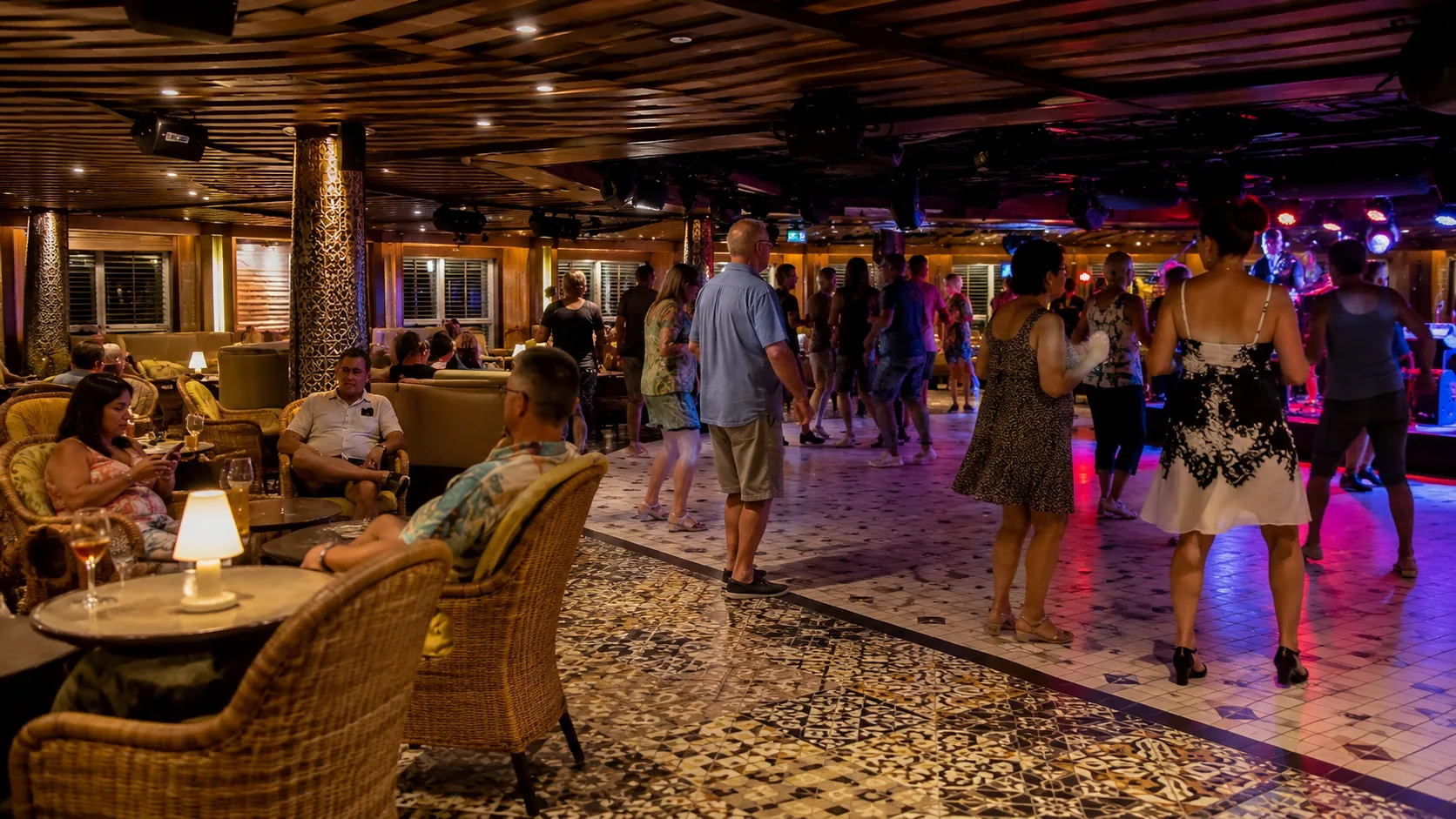 Guests dancing beside the Havana Bar on Carnival Horizon