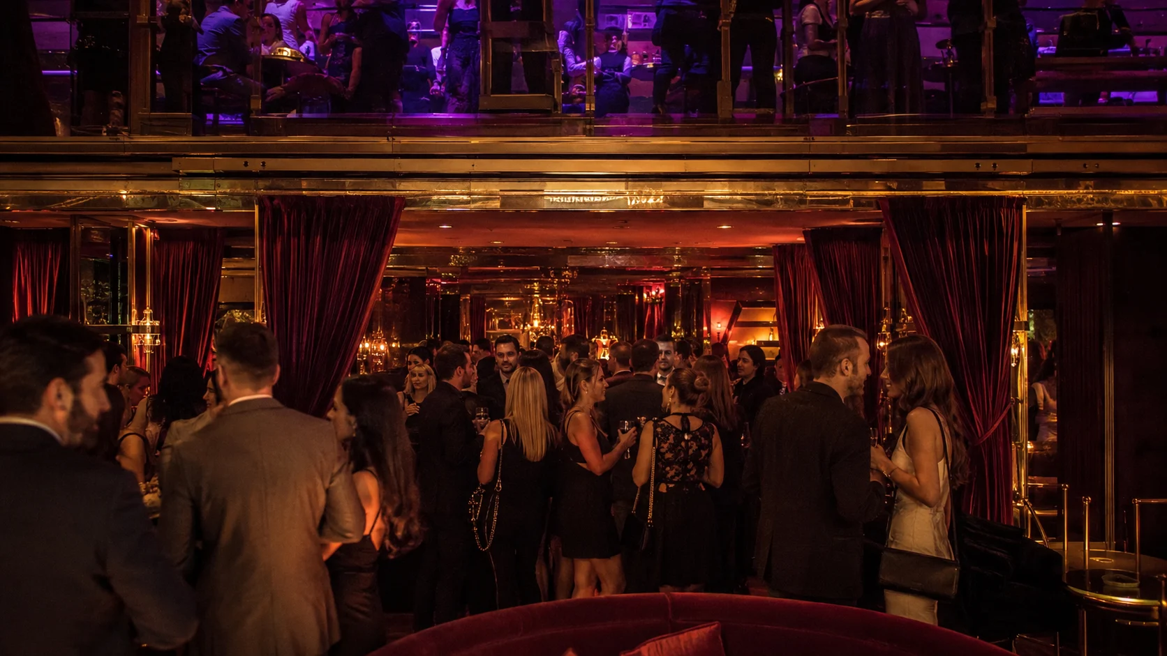 Guests dancing inside The Manor nightclub on Resilient Lady