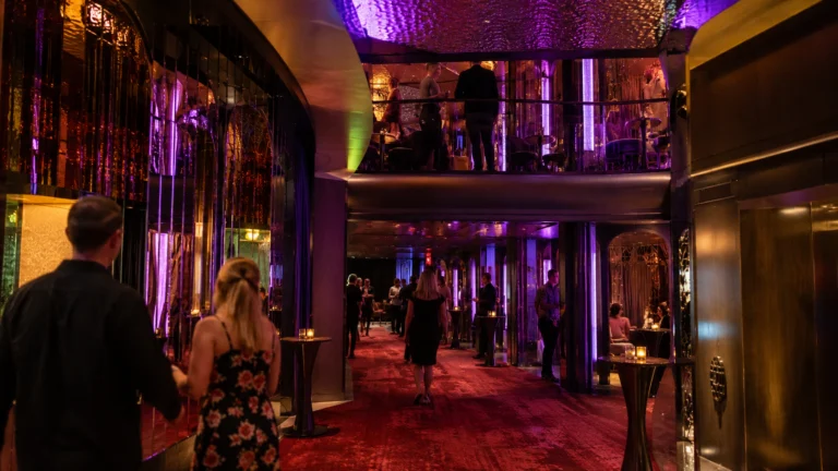 Guests dancing inside The Manor nightclub on Valiant Lady