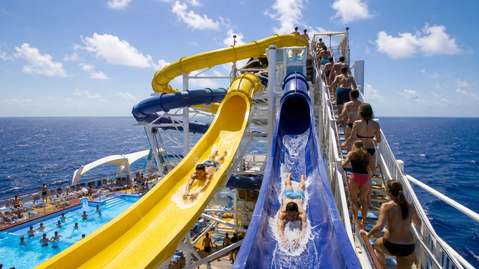 Guests riding the Perfect Storm waterslides aboard Adventure of the Seas
