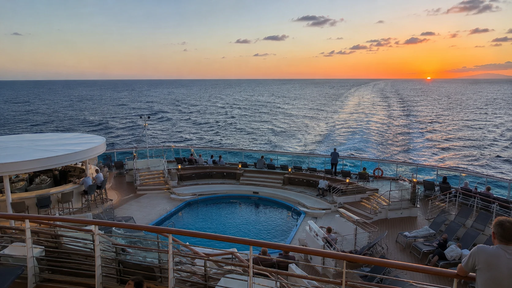 Aft pool overlooking the ocean at sunset