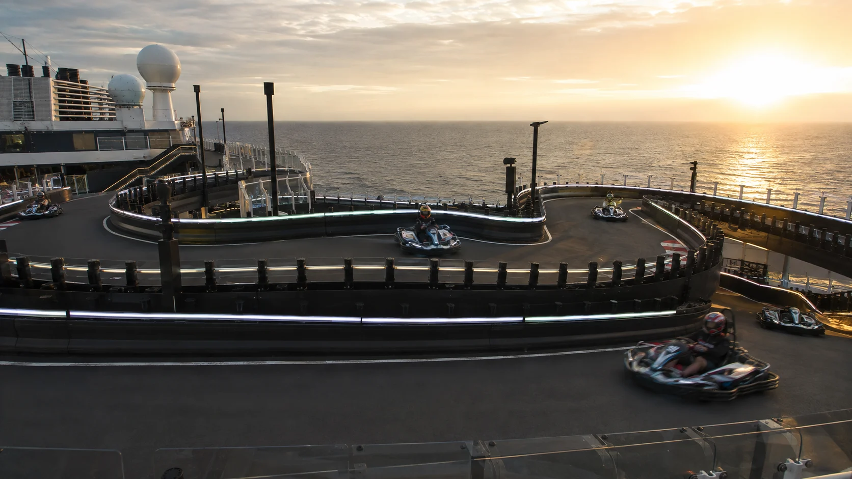 Go-karts racing on the three-level speedway aboard Norwegian Viva