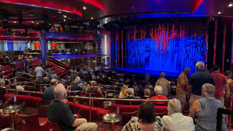 Audience gathering in the Liquid Lounge on Carnival Horizon