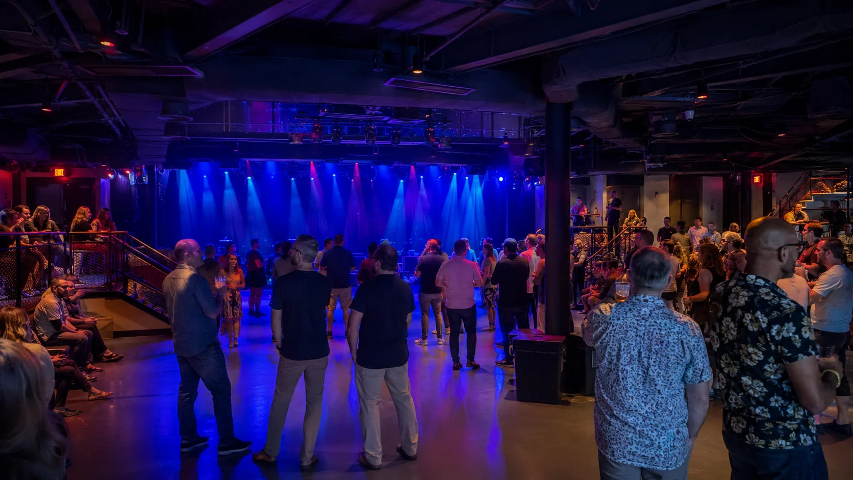 Guests dancing in The Red Room aboard Valiant Lady