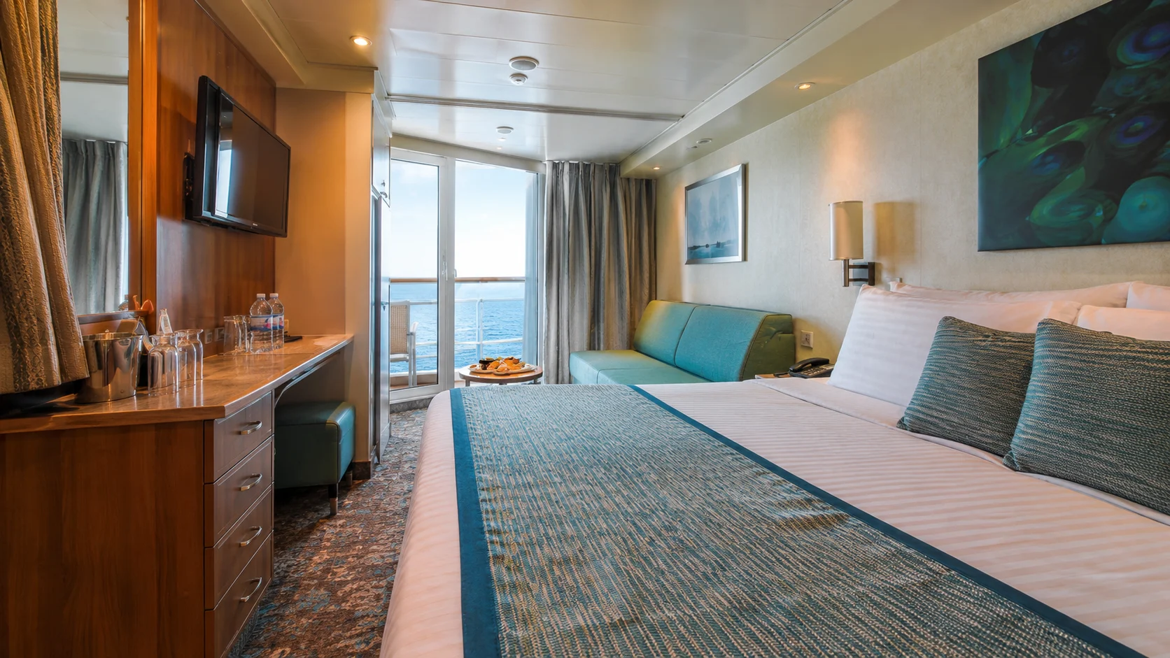 Carnival Panorama balcony cabin with a sofa and ocean view
