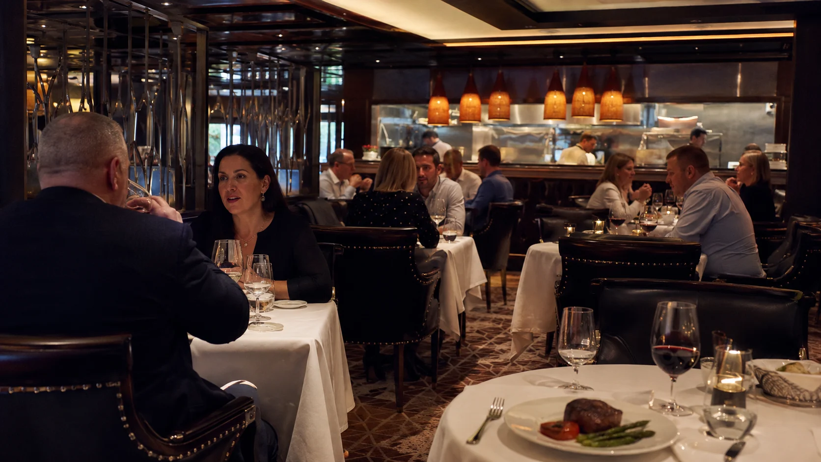 Guests dining at Crown Grill aboard Discovery Princess