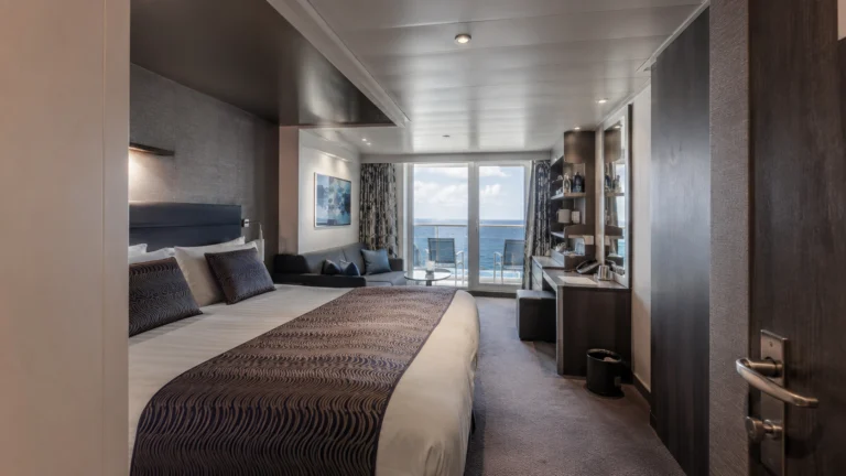 MSC World Europa balcony cabin with a sofa and ocean view