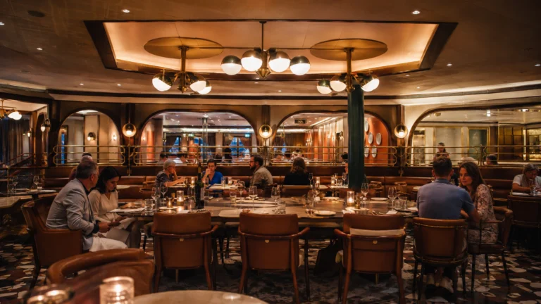 Dining room and bar inside Il Viaggio on Carnival Firenze