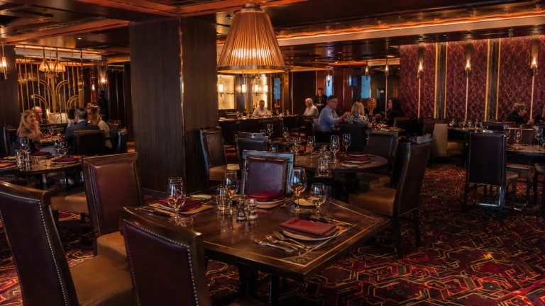 Dining room at Fahrenheit 555 steakhouse on Carnival Horizon