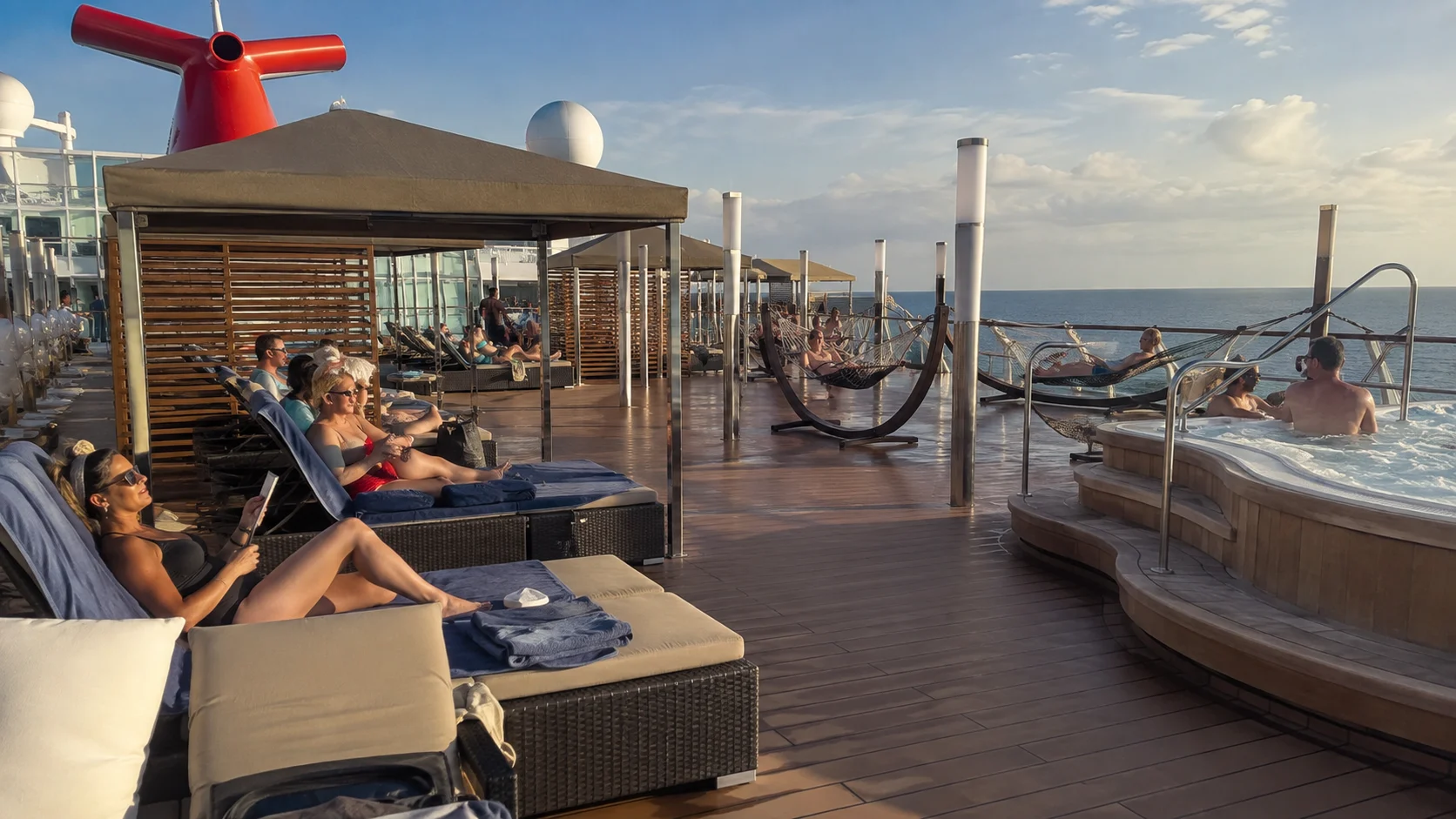 Hot tubs and loungers on the Serenity deck aboard Carnival Horizon