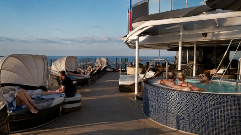 Loungers and bar on the Serenity deck aboard Carnival Panorama