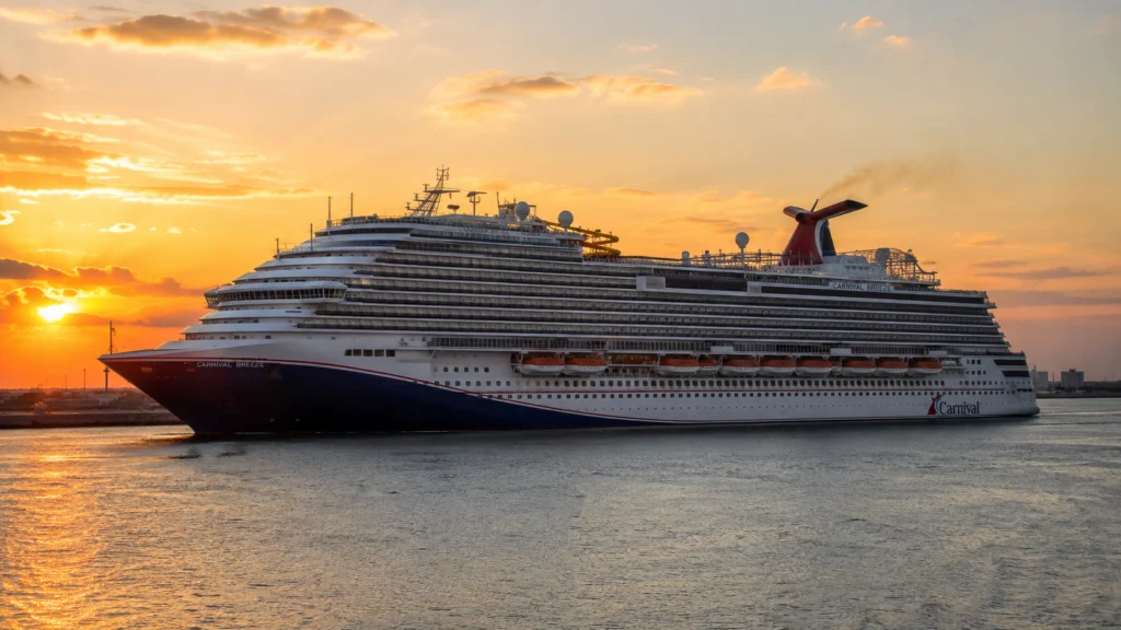 Carnival Breeze sailing at golden hour