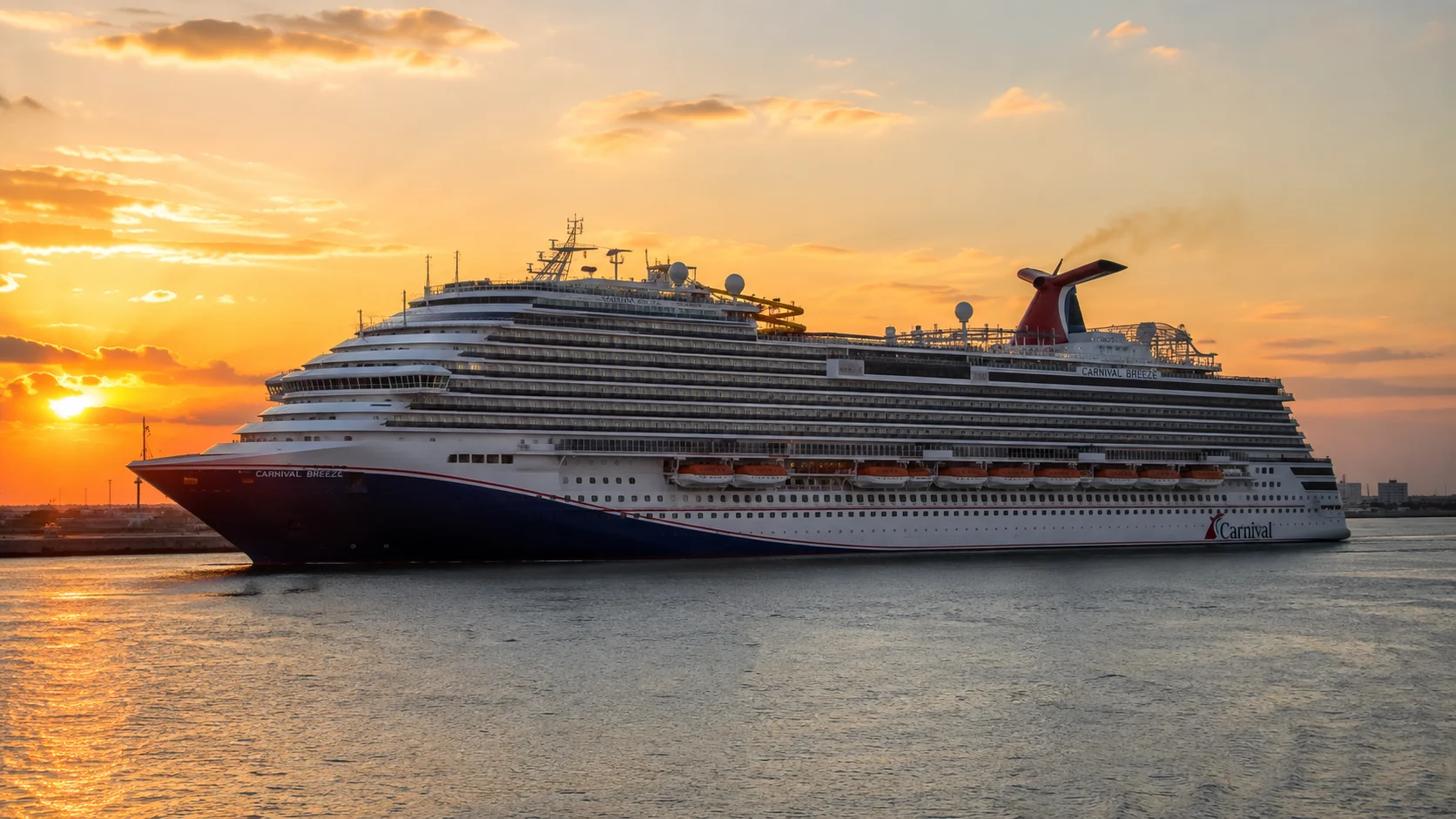 Carnival Breeze sailing at golden hour