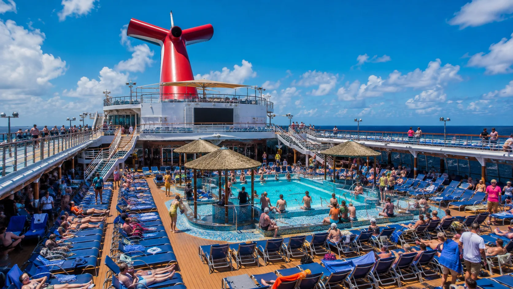 Busy pool deck aboard Carnival Freedom