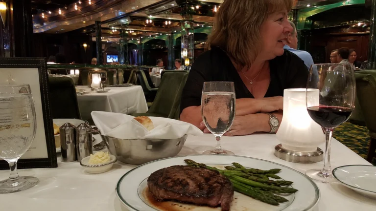 Steak and asparagus served at a cruise ship restaurant table