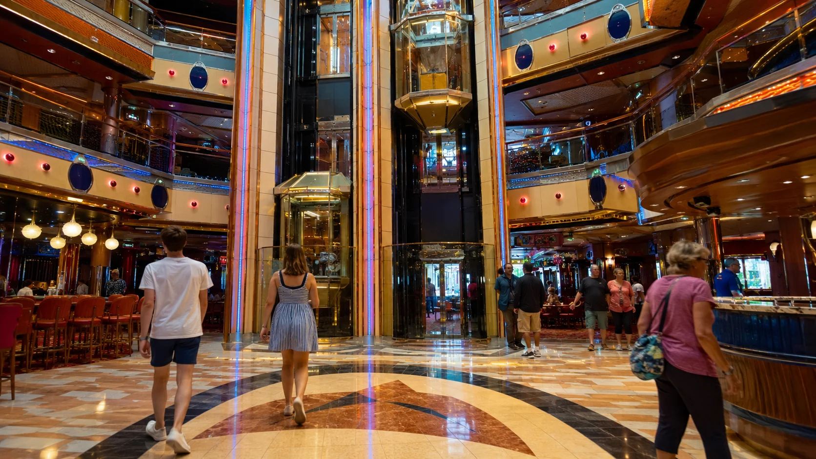 Passengers in a multilevel cruise ship atrium with glass elevators