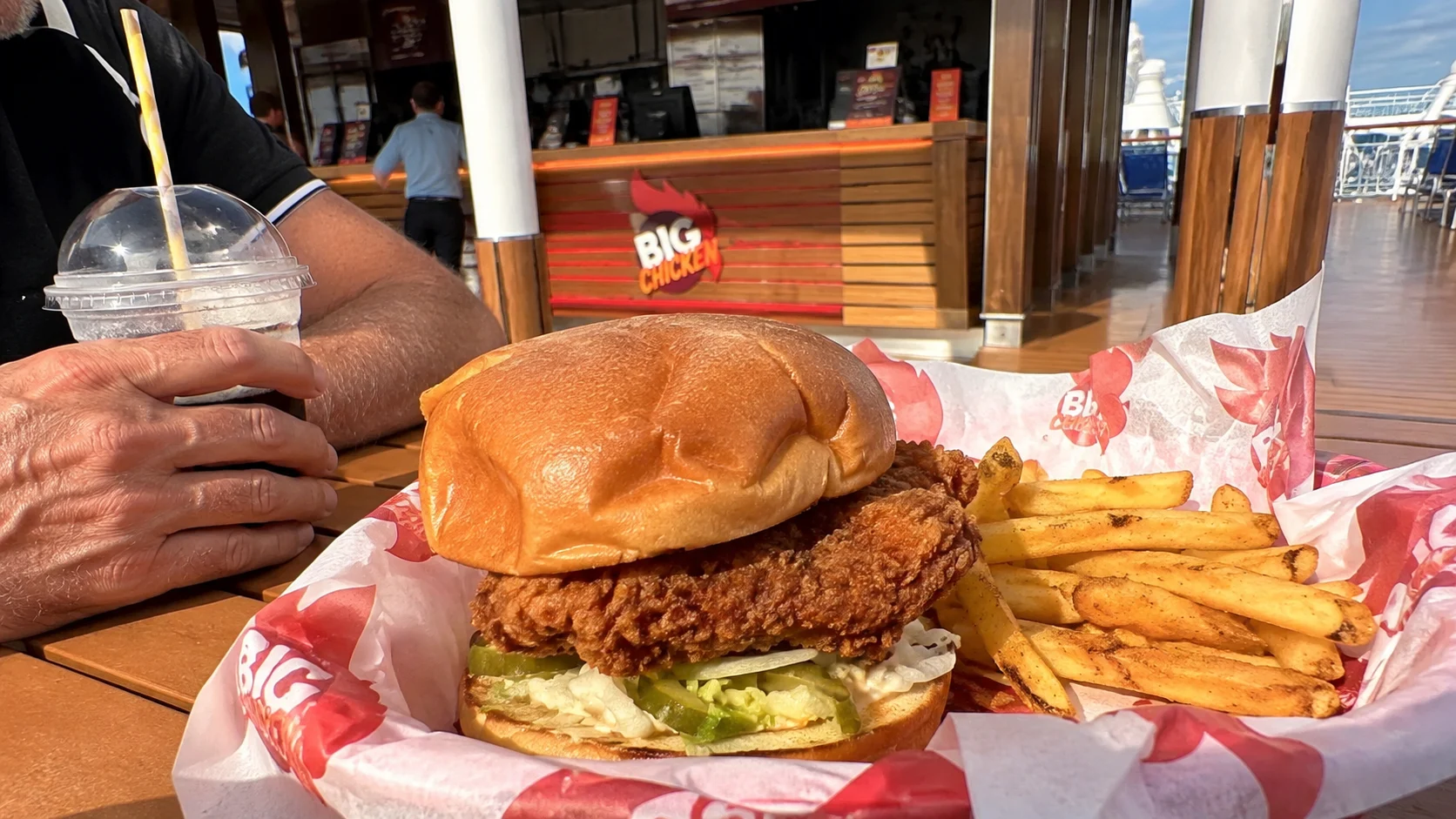Fried chicken sandwich and fries at a Big Chicken restaurant