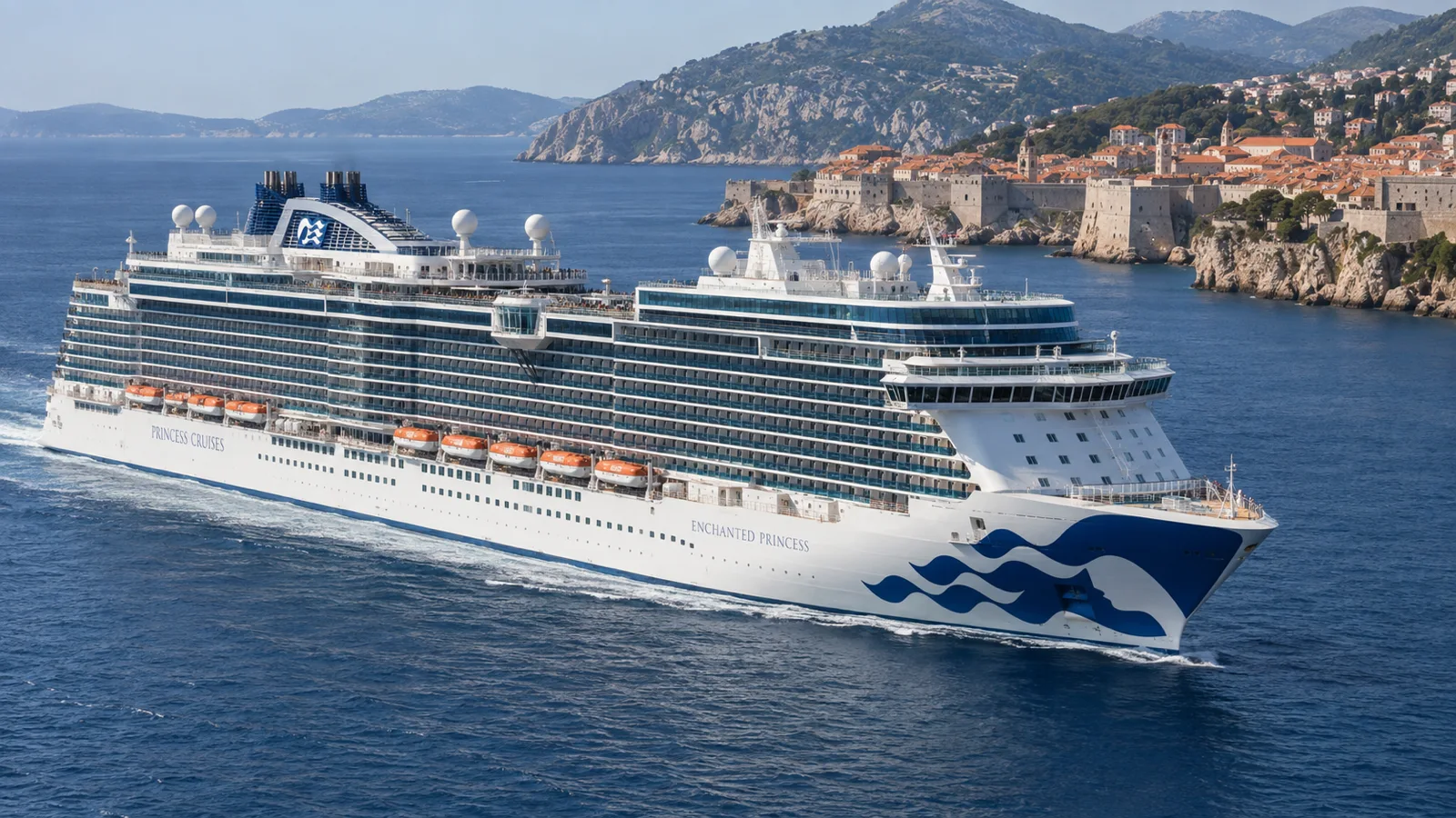 Enchanted Princess sails past Dubrovnik's historic walls on a clear Adriatic morning.