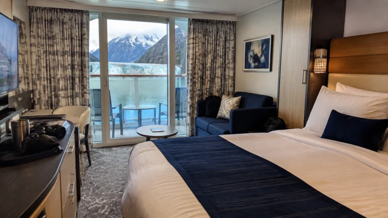 Ovation of the Seas stateroom overlooking an Alaskan fjord