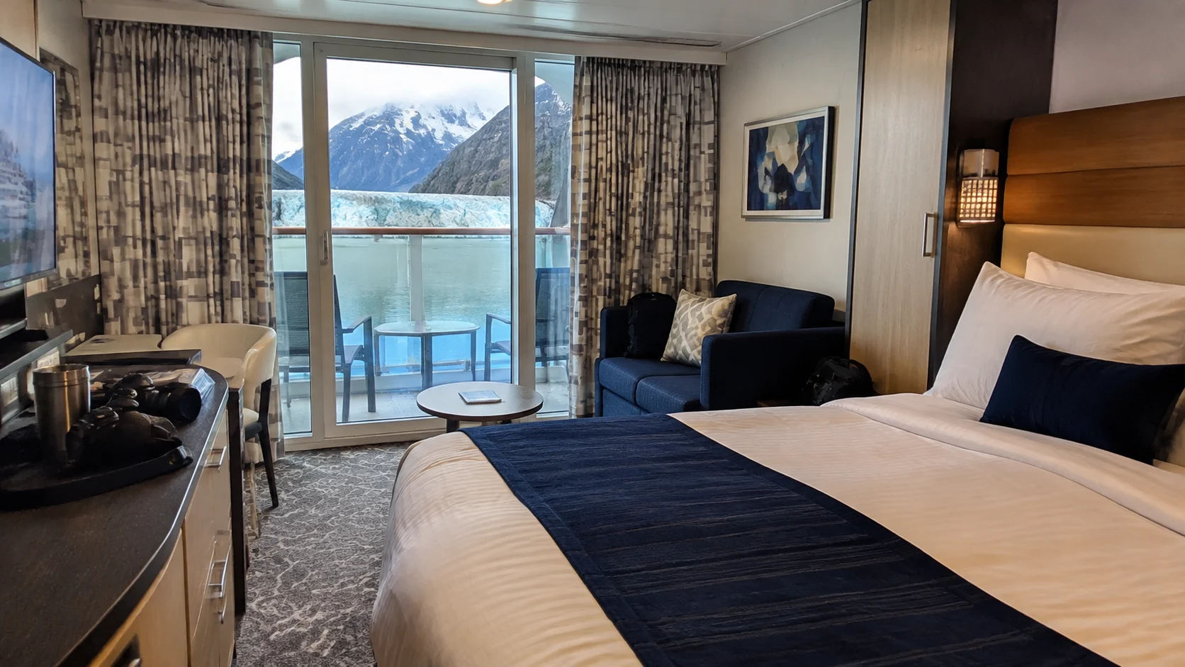 Ovation of the Seas stateroom overlooking an Alaskan fjord