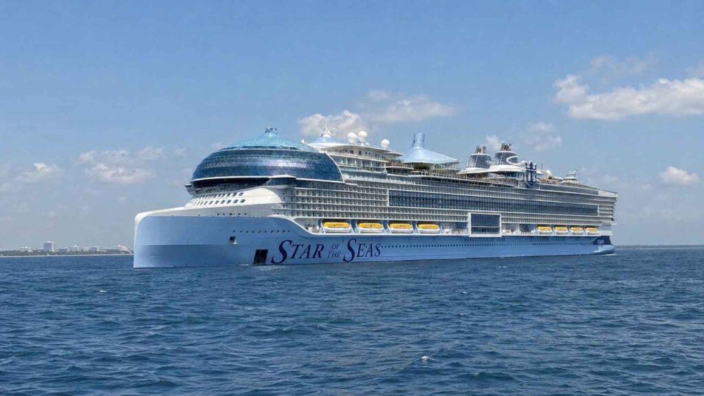 Star of the Seas at sea with the ship's name painted on the hull