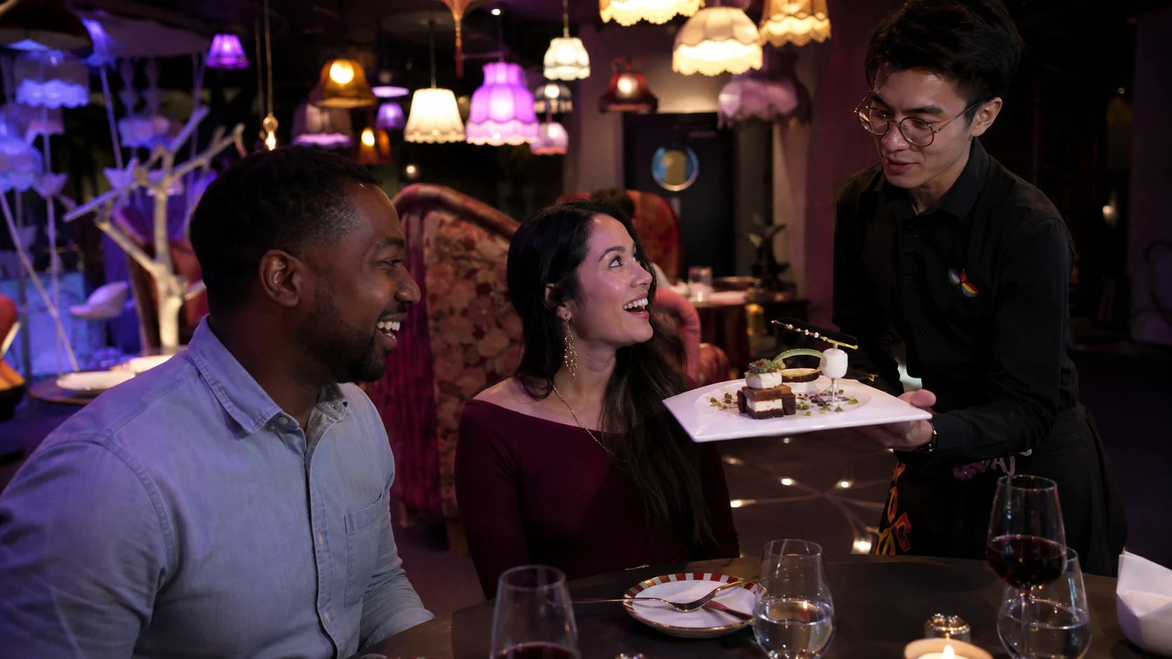 Couple dining at Wonderland aboard Quantum of the Seas