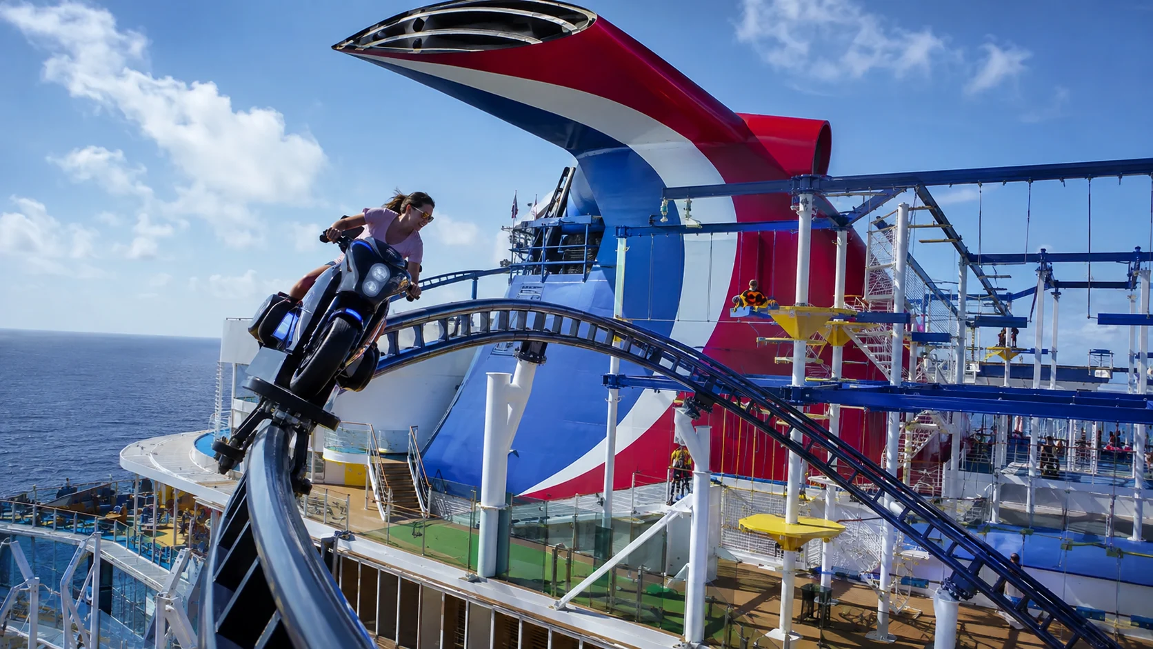 Riders on the BOLT roller coaster aboard Carnival Celebration