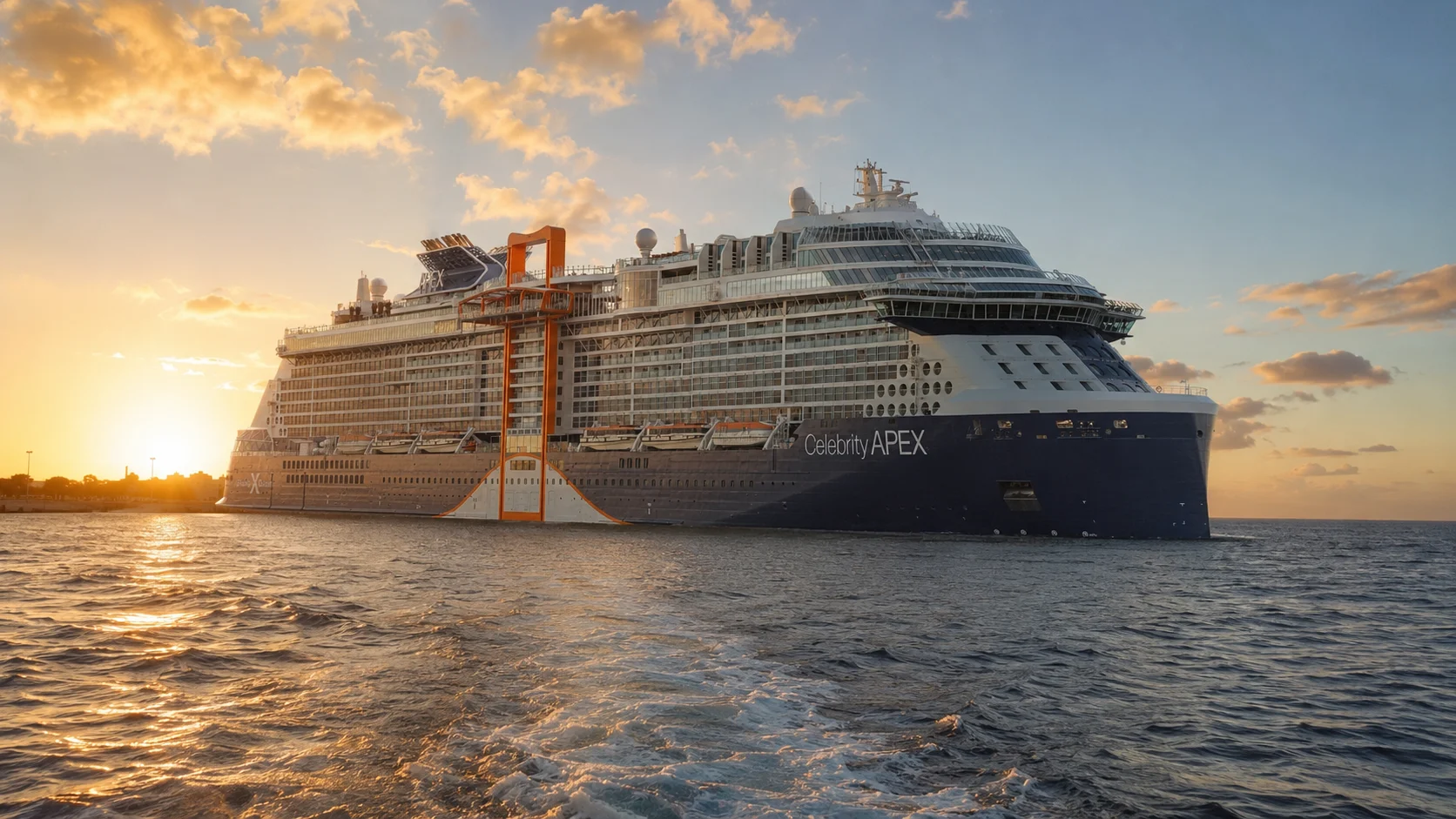 Celebrity Apex sailing at sunset