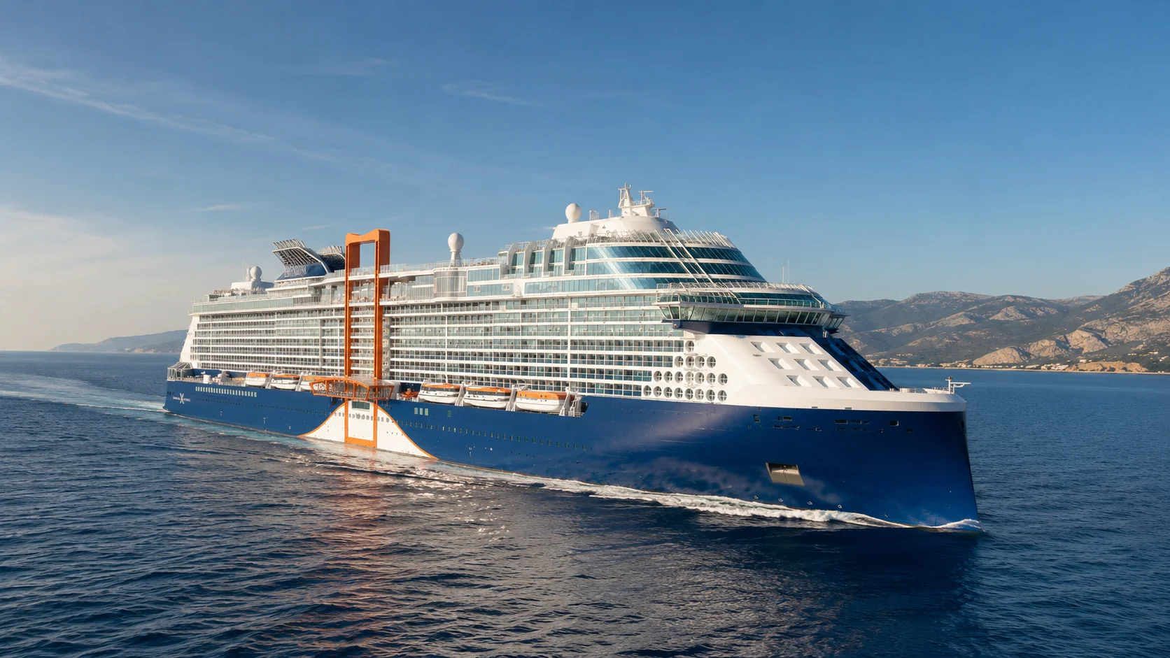Celebrity Beyond sailing along a mountainous coastline