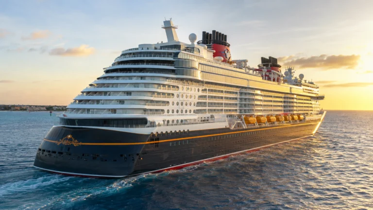 Disney Treasure sailing at sunset