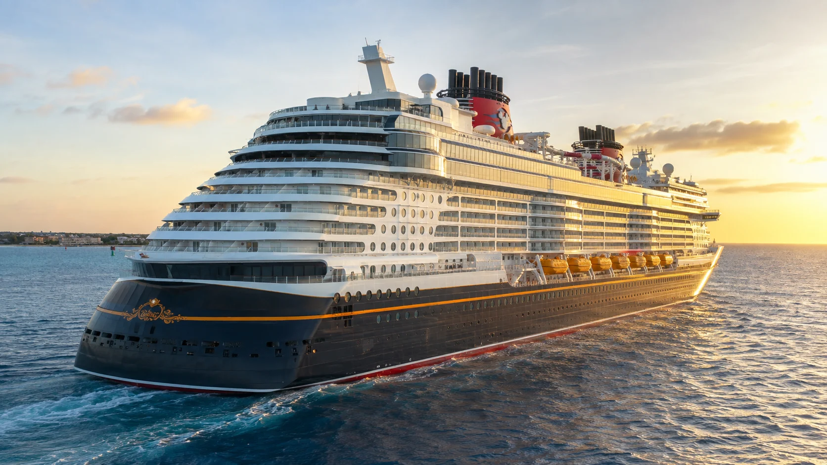 Disney Treasure sailing at sunset