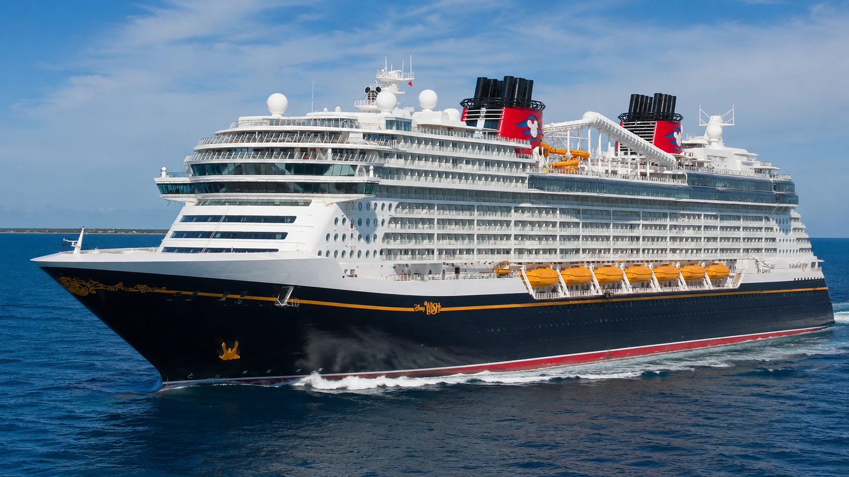 Disney Wish sailing bow-first across deep blue water