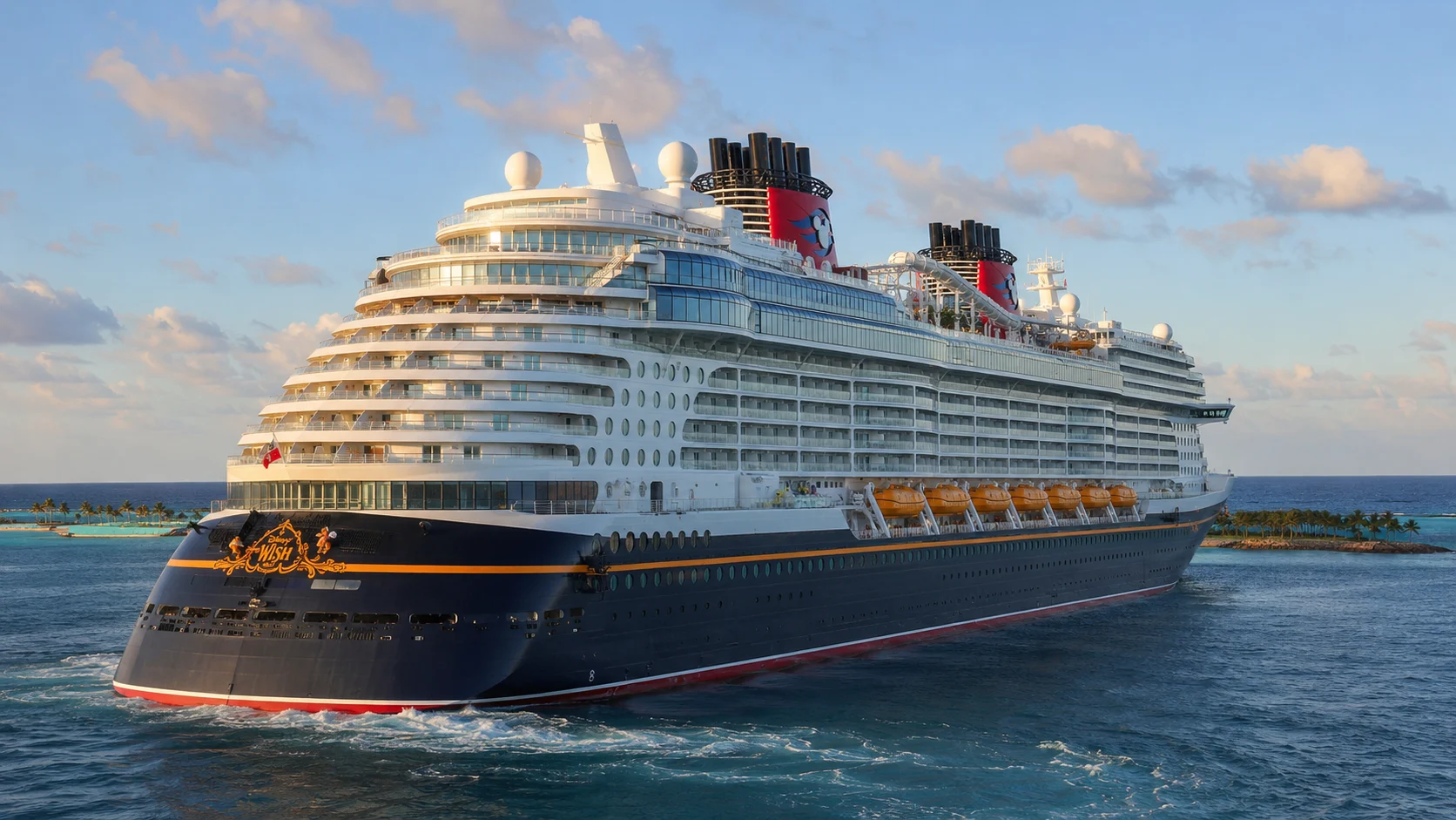 Disney Wish sailing broadside near a low shoreline