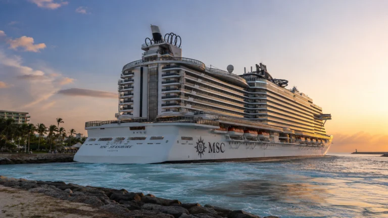 MSC Seashore sailing at sunset