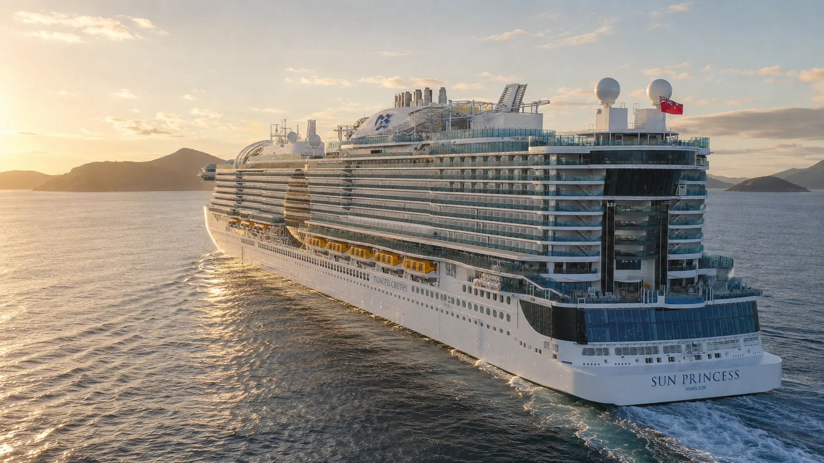 Sun Princess sailing past mountains at sunset
