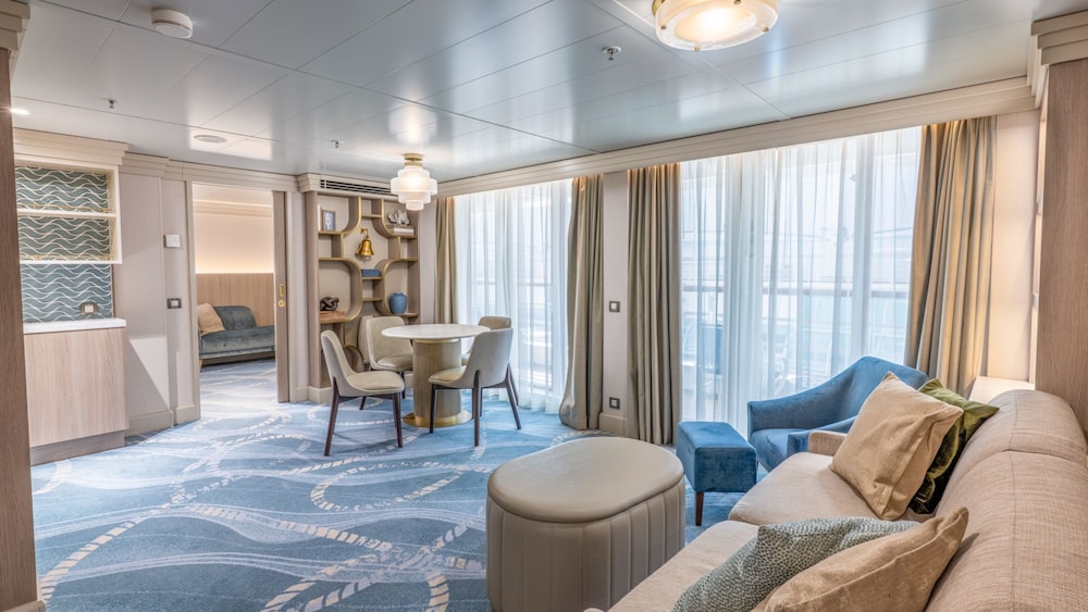 Representative Disney Wonder Concierge one-bedroom suite living room