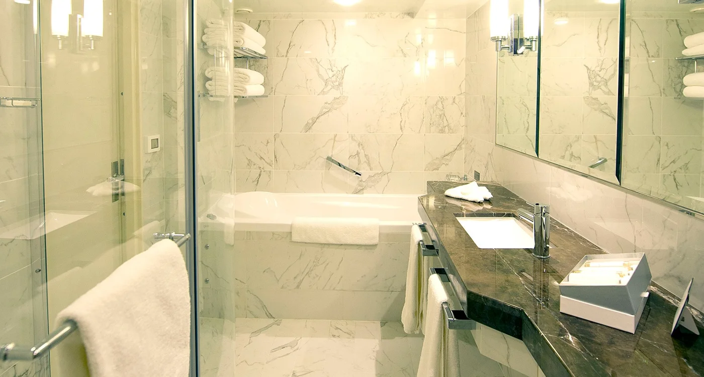 Representative Britannia Suite bathroom with bath and separate shower