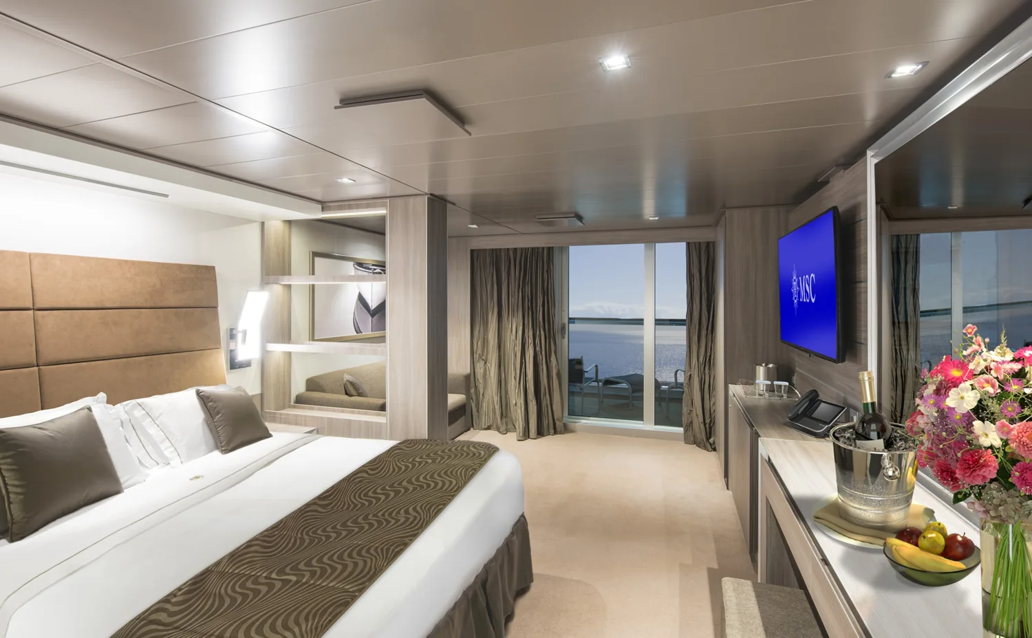Representative MSC Seaview Yacht Club Deluxe Suite with balcony doors
