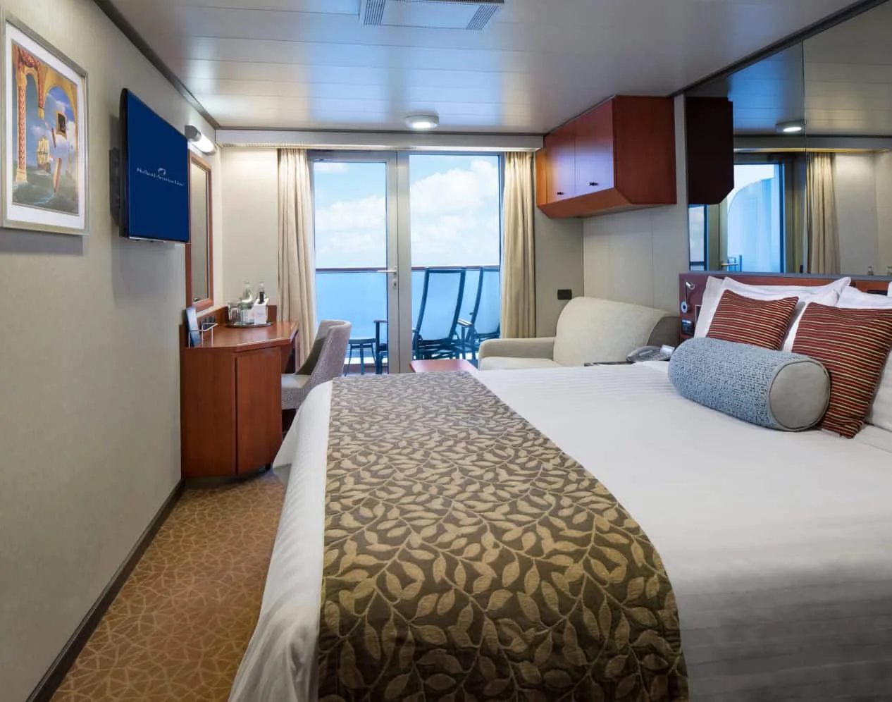 Representative Nieuw Amsterdam Verandah stateroom with a bed, sofa and balcony doors