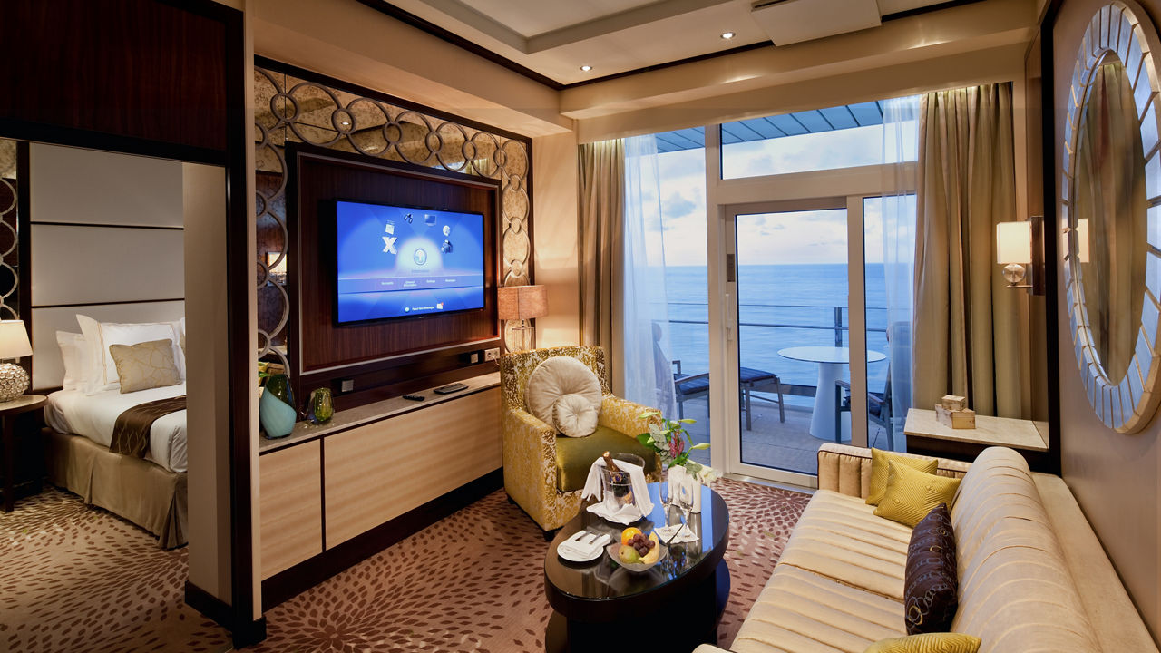 Celebrity Reflection Signature Suite representative bedroom and living area