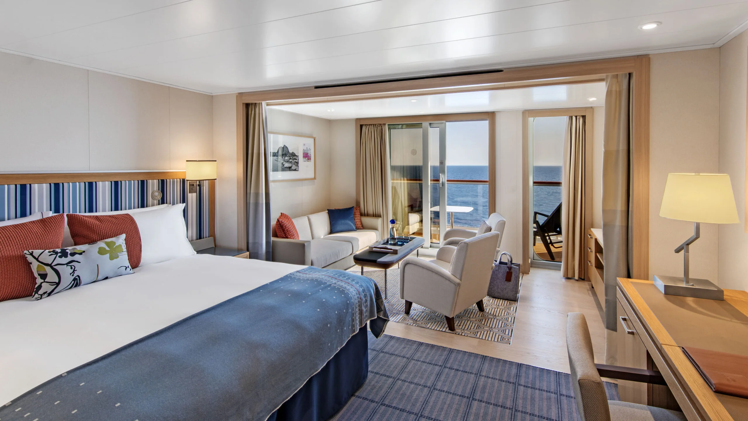 Viking ocean-fleet Penthouse Junior Suite representative living space, shown on the Vela accommodation page